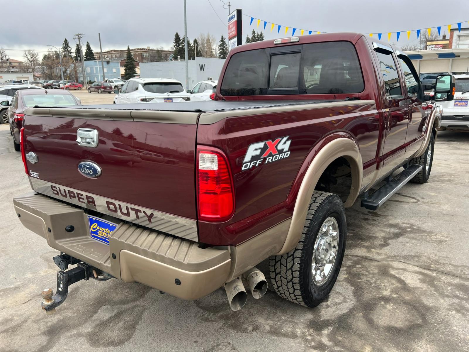 2012 Maroon /Brown Ford F-350 SD King Ranch (1FT8W3BT7CE) with an 6.7L V8 F OHV 32V DIESEL engine, Automatic transmission, located at 116 5th Avenue South, Lewistown, MT, 59457, 47.063877, -109.427879 - Introducing the ultimate combination of power and luxury – the 2012 Ford F350 Crew Cab King Ranch 4x4. With its robust Powerstroke diesel engine, this truck is built to handle anything you throw at it. Whether you're towing a trailer or cruising around town, the F350 delivers top-notch performance - Photo #2